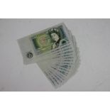 A consecutive run of sixteen one pound notes,