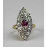 A diamond and ruby marquise shaped cluster, the central ruby within a two tier diamond set surround,