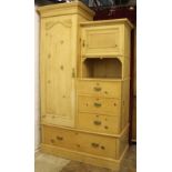 A late Victorian pine wardrobe, with cupboard door and panelled door,