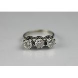 A three stone diamond ring,