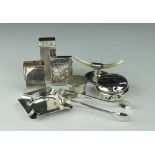 A selection of small silver to include; a Dunhill lighter, a silver ash tray, Sheffield 1939,