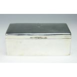 A military silver cigar box, A & J Zimmerman, Birmingham 1915, of plain polished rectangular form,