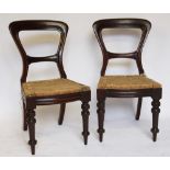 A set of four Victorian mahogany dining chairs,