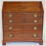 A George III style mahogany bureau, with fall enclosing a fitted interior,