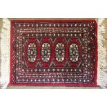 Five Afghan wool prayer mats,