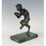 A bronze figure of a Faun after the antique, modelled on one leg, on green marble base,