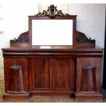 A William IV carved mahogany inverted breakfront pedestal sideboard,