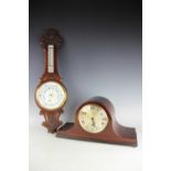 A Victorian carved oak barometer, with ceramic dial, 68cm, with a mahogany mantel clock,