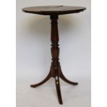 A George III provincial oak tilt top occasional table,