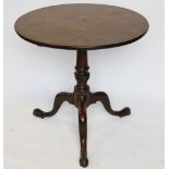 A George III mahogany tilt top occasional table, with single piece circular top,