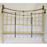 A late Victorian cast iron and brass double bed, with ball finials,