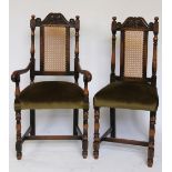 A set of eight Carolean style carved and stained oak dining chairs, including two with arms,