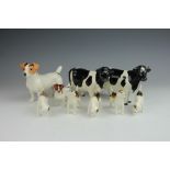 A selection of Beswick animals to include; two Claybury Leegwater Friesian cows, five hounds,