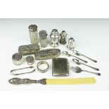 A collection of assorted small silver, to include; a Victorian silver scent bottle, condiments,