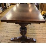 A 17th century style carved oak drawer leaf dining table, with carved frieze,