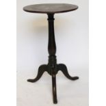 A George III oak tripod table, with turned column,