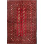 TAPPETO turcomanno persiano in lana. XX secolo Misure: cm 215 x 130