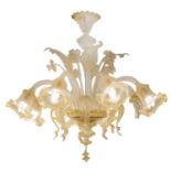 LAMPADARIO a sei luci in vetro Murano bianco e oro. XX secolo Misure: h cm 85