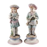 COPPIA SCULTURE in biscuit raffiguranti "fanciulli". Francia XIX secolo Misure: h cm 43