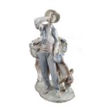 GRUPPO in porcellana Lladro raffigurante "ragazzo con cavallo". Spagna XX secolo Misure: h cm 27