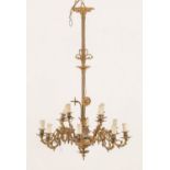 LAMPADARIO in metallo dorato a 16 luci. Sicilia XIX secolo Misure: h cm 88