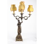 RODANY CANDELABRO in bronzo a cinque luci raffigurante "figura femminile".  Misure: h cm 74