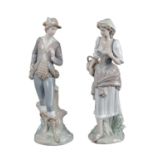 COPPIA SCULTURE in porcellana Lladro raffiguranti "fanciulla" e "ragazzo". Spagna XX secolo