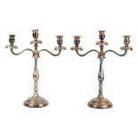 COPPIA CANDELABRI a tre fiamme in argento (g. 684). XX secolo Misure: h cm 39