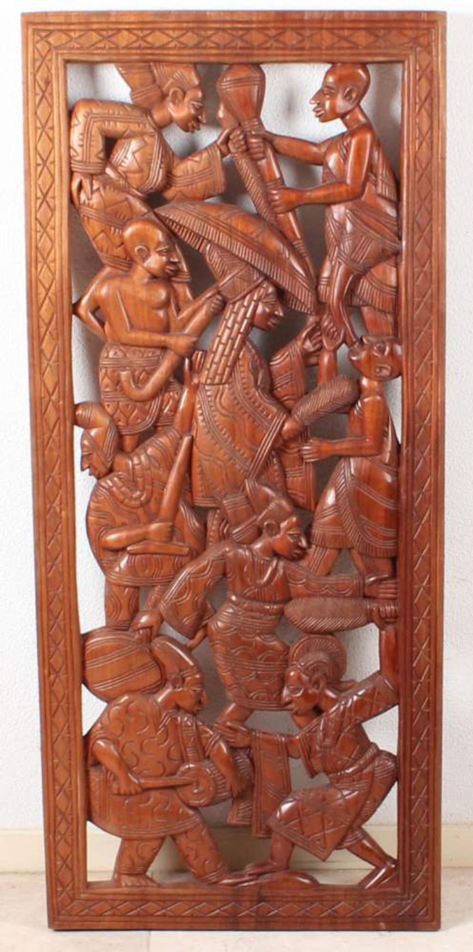 Eastern wood stabbed teak panel with figures, 2nd half of 20th century 107x47cm Cond: G Eastern Holz