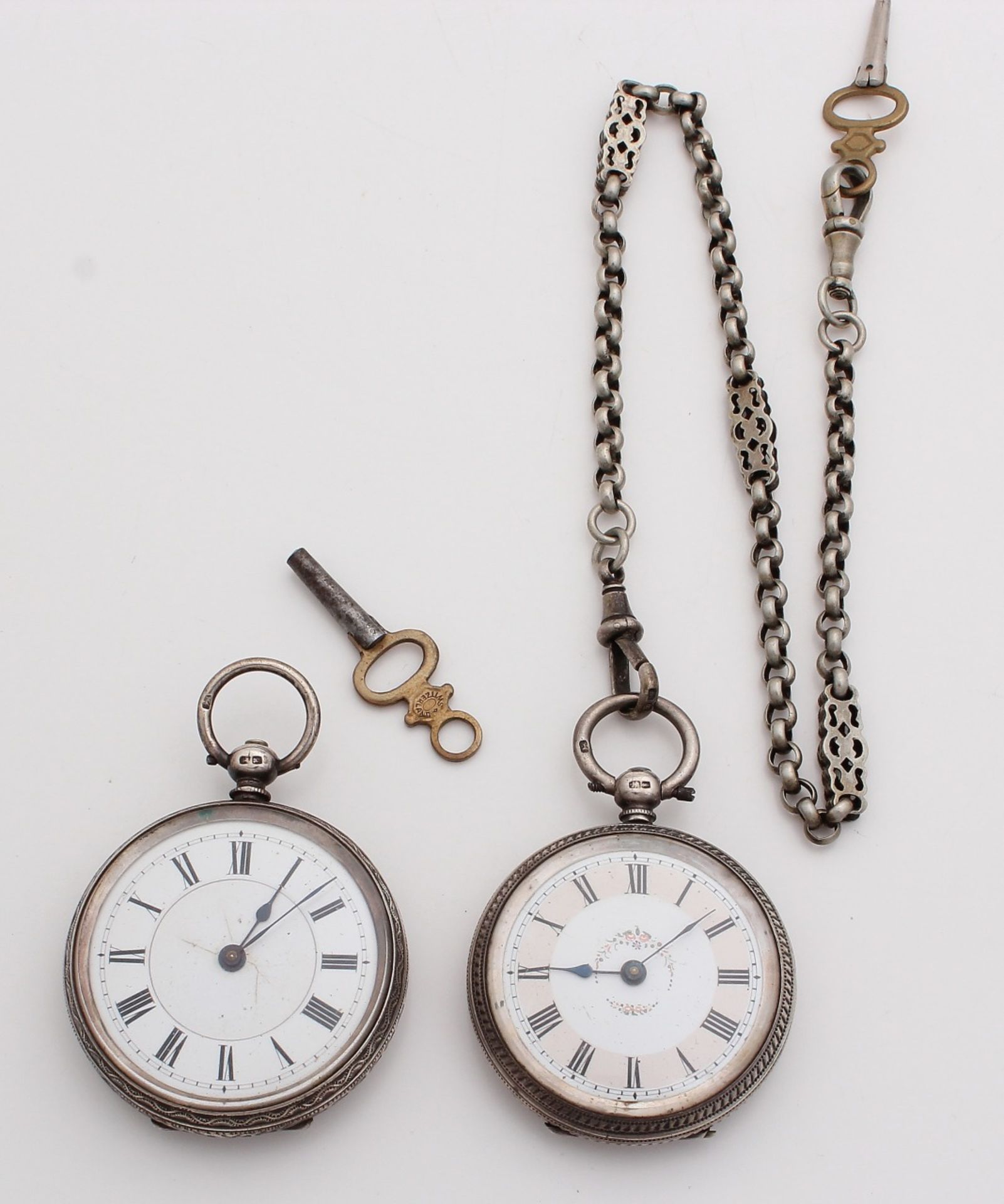 Lot with two silver pocket watches, English 925/000. A pocket watch with a dial decorated with small