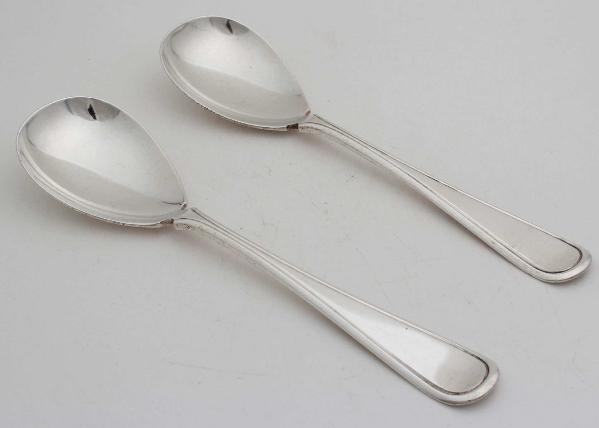 Set silver Art-Deco spoons, 835/000, with fillet operation on the steal. MT .: JM van Kempen,