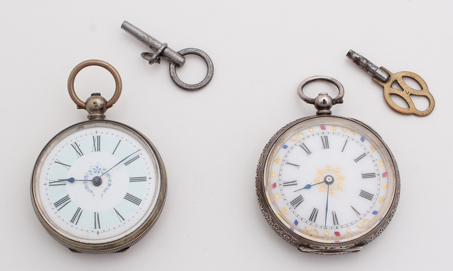 Lot with two silver pocket watches, 800/000 and 935/000. A pocket watch with a dial decorated with