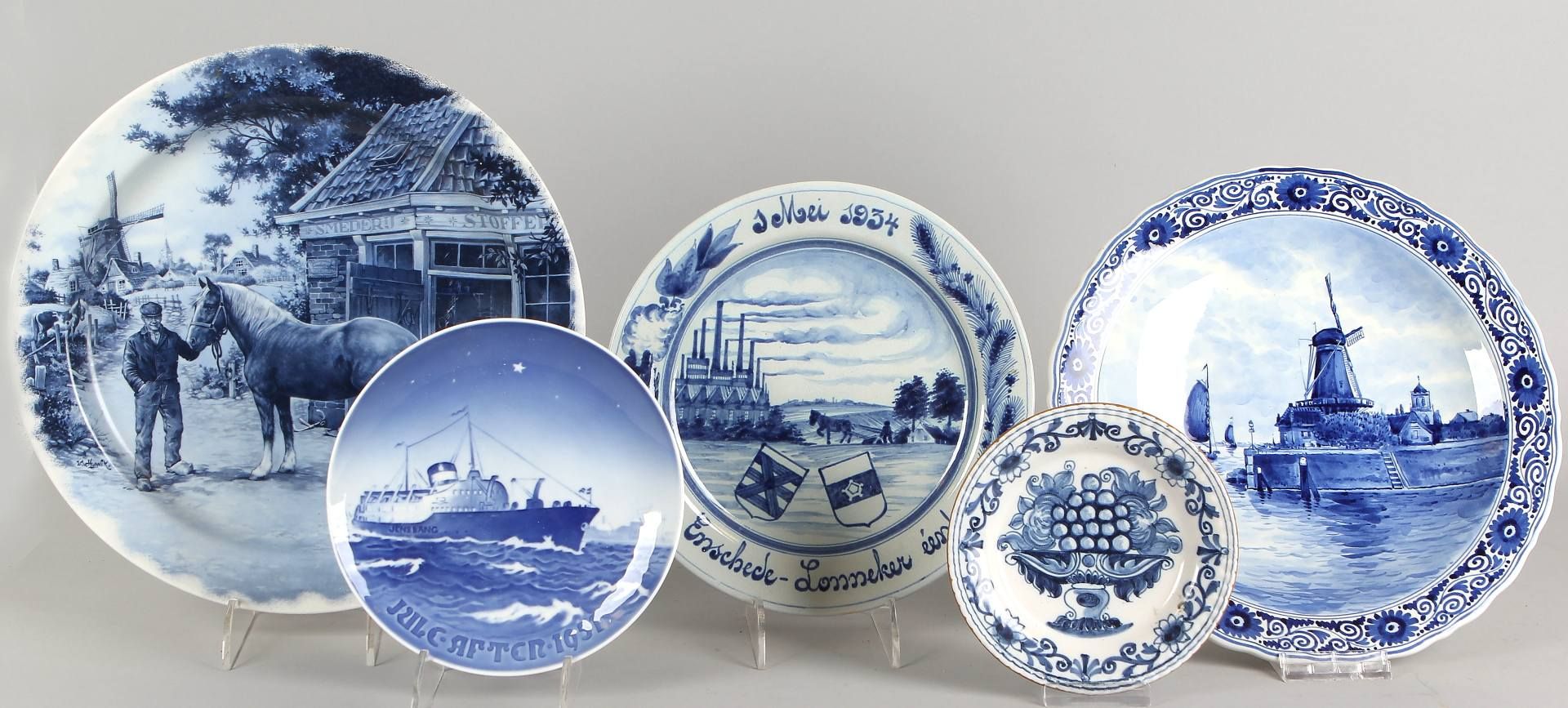 Five different old ceramic plates, 20th century include Makkum, Bing and Fröhndal old Delft,