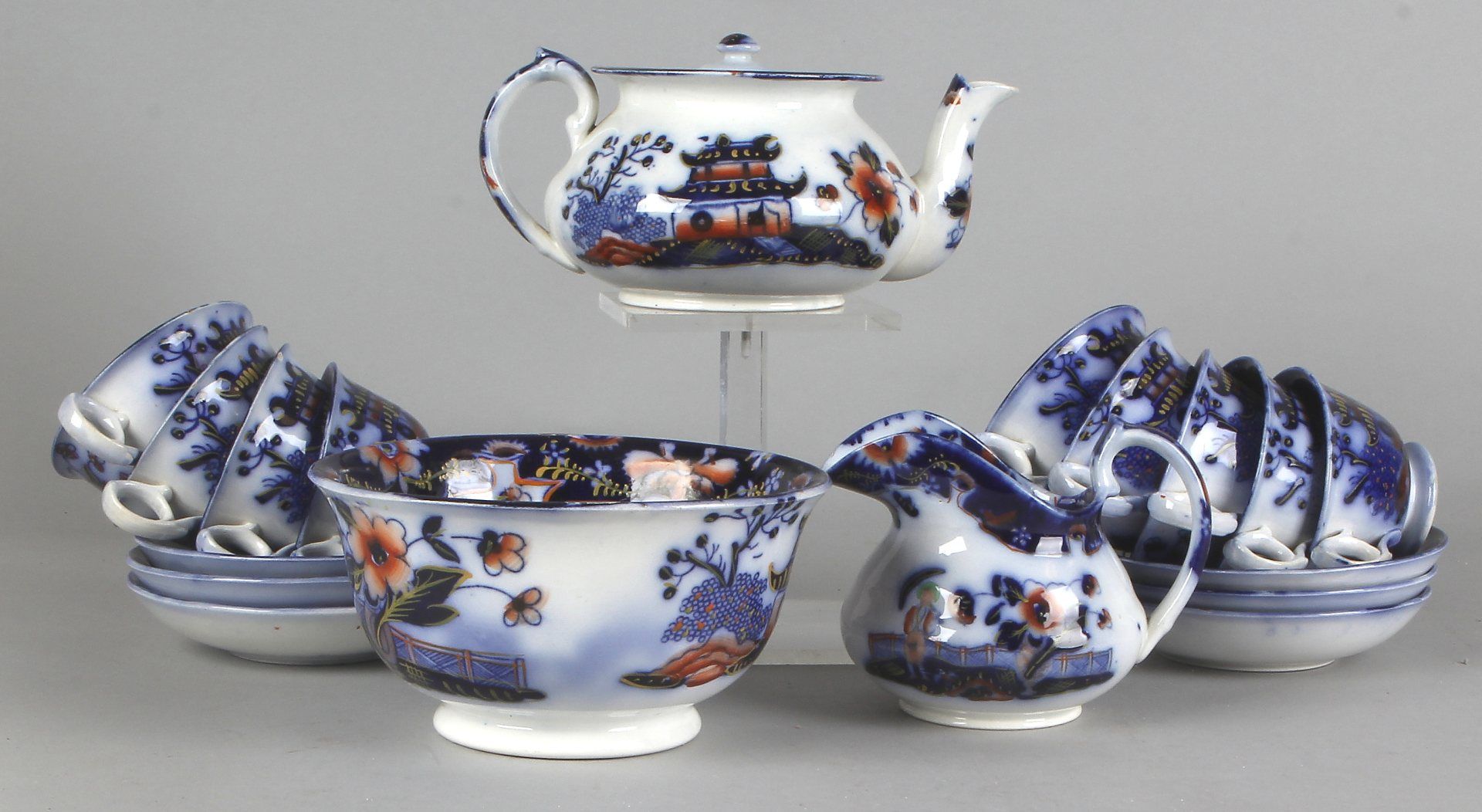 Nineteenth century ceramic dinnerware, tea pot, kastkom, six cups and saucers, creamer, three