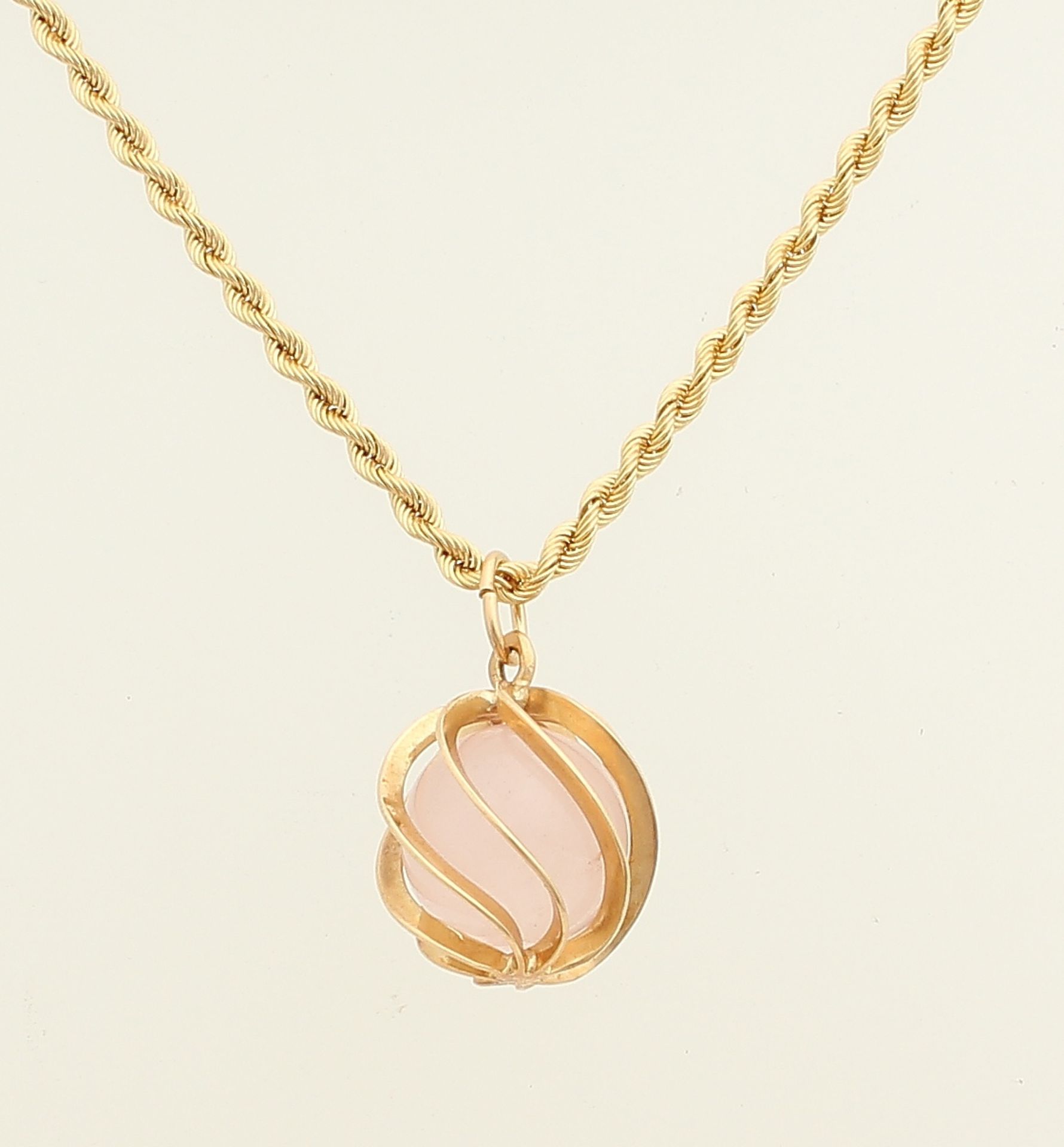 Gold necklace and pendant, 585/000 with rose quartz. Cord necklace with an openwork gold pendant