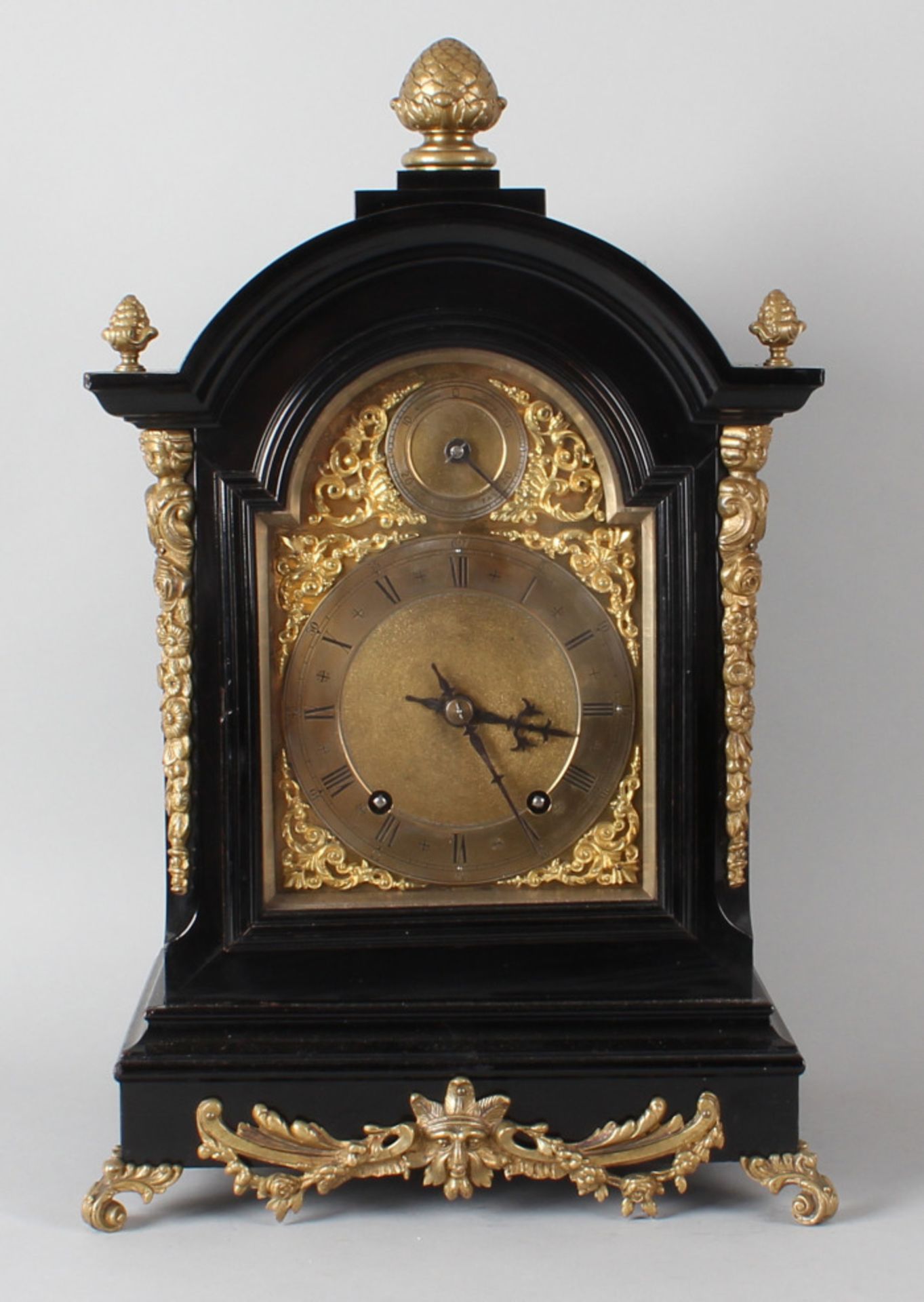 Black Winterhalter and Hofmeier table clock with bronze trim work around 1900 movement with