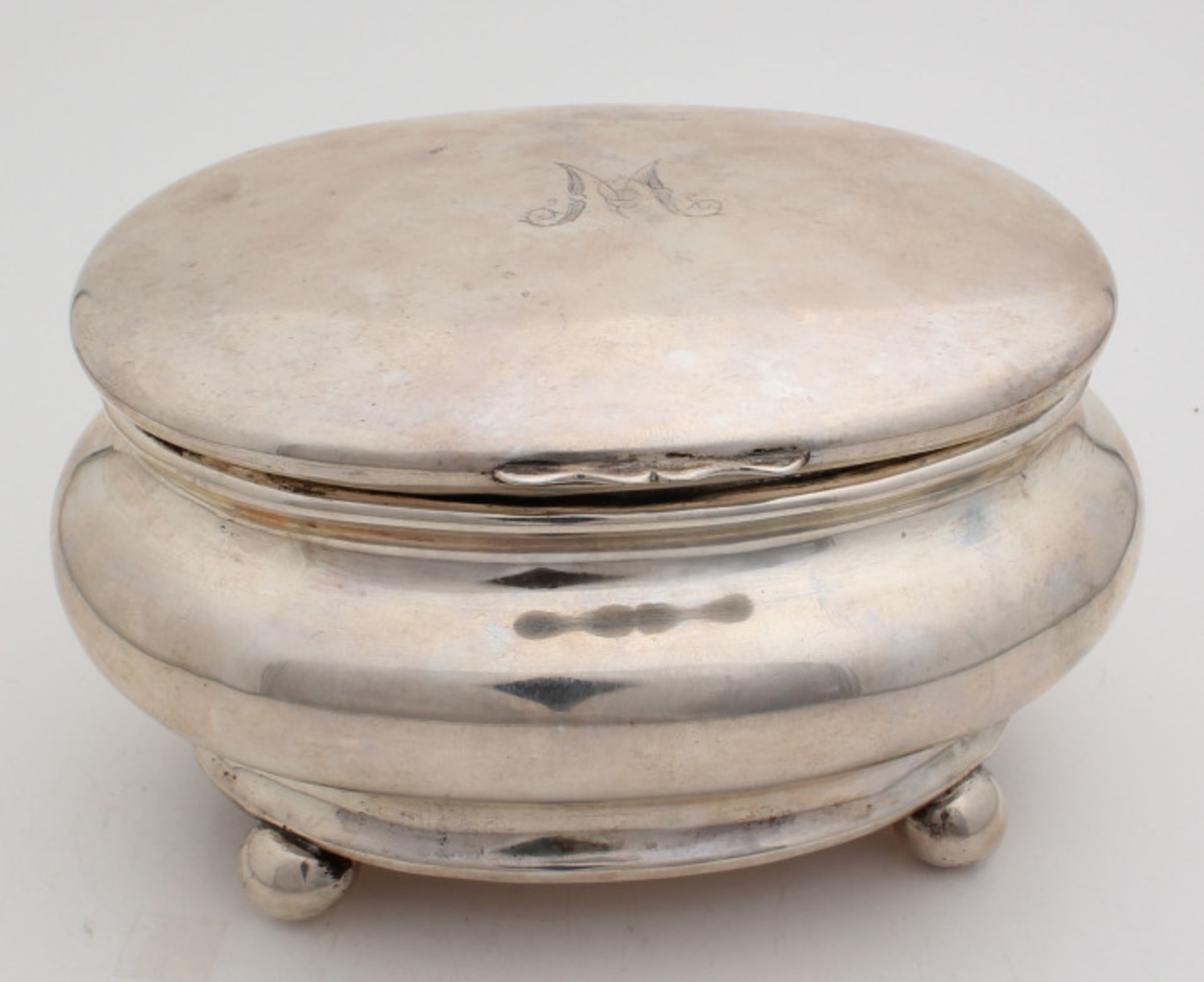 Beautiful silver oval box making, Austria. Oval smooth ball-shaped tea box on four ball feet,