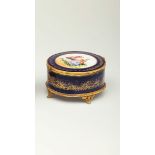 Porcelain Box French, 20th century, cobalt blue porcelain box. Framed in bronze, and gilded in