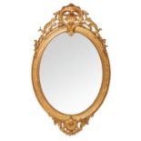 French Dore Mirror French, 19th century, gold leaf guilded oval hall mirror, featuring crown and