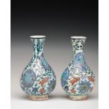 Pair of Kütahya Ceramic Vases 19th century, green, cobalt blue, coral red and blue colors on a white