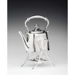 Spirit Kettle British, 20th century, silver-plated metal teapot and stand with heater. Stamped and