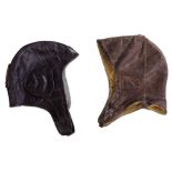 Pilot Hats - 2 Pieces German, 1930-1960's, two leather pilot hats. 28-30 cm