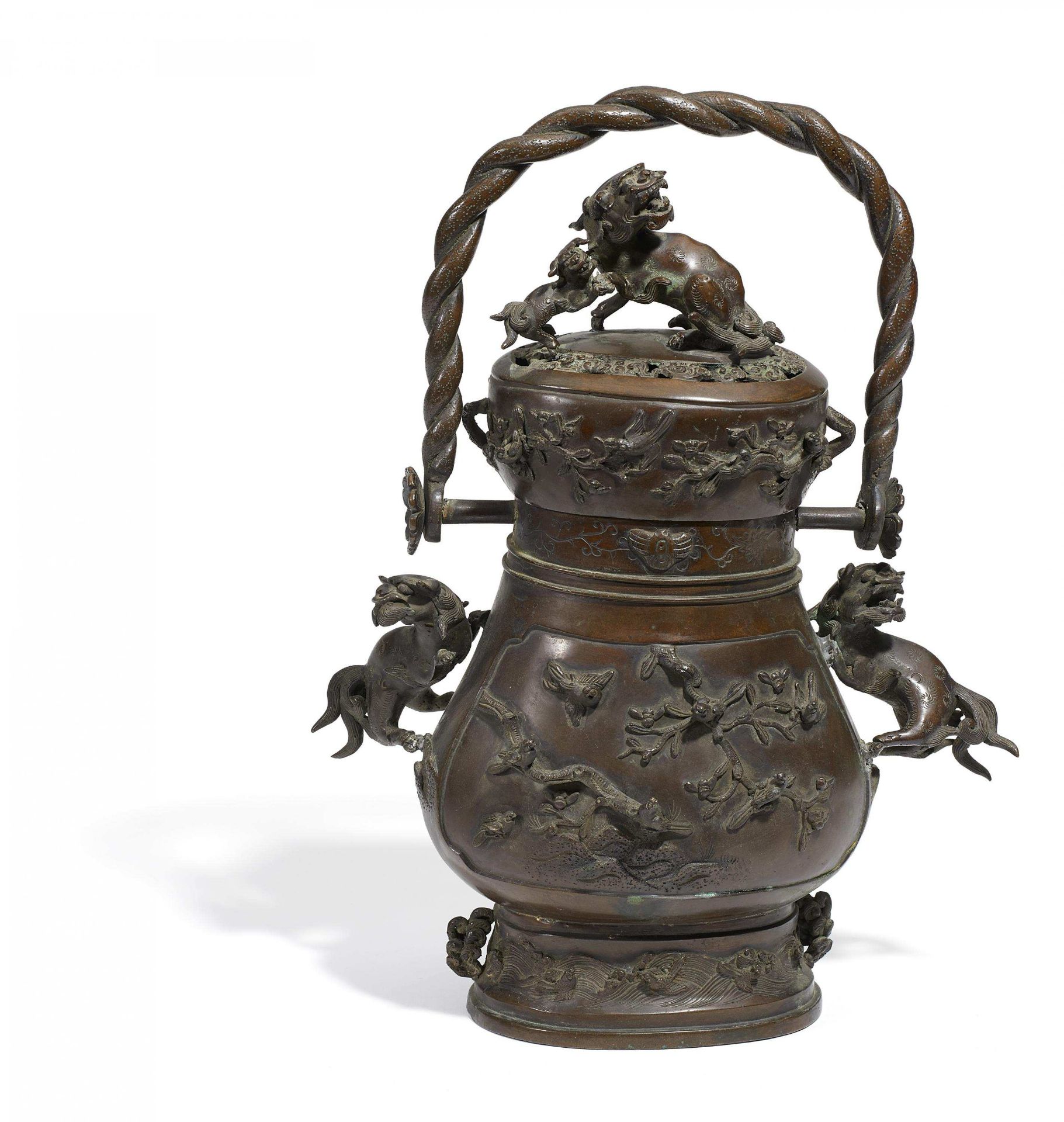 CENSER WITH HANDLE. Japan. Meiji period. Bronze with dark patina. In the shape of a somewhat