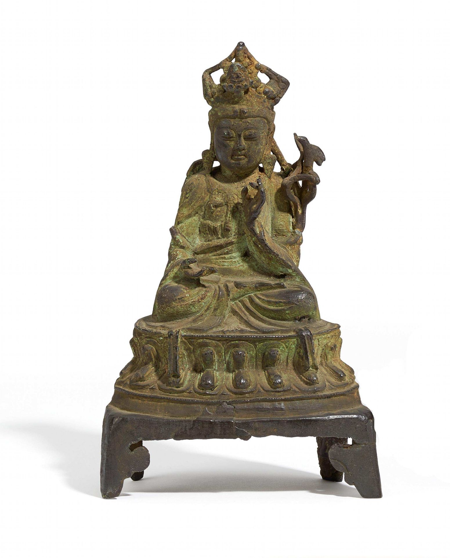 GUANYIN WITH PARROT. China. Late Ming dynasty. Bronze with green patina. Sitting on a lotus throne