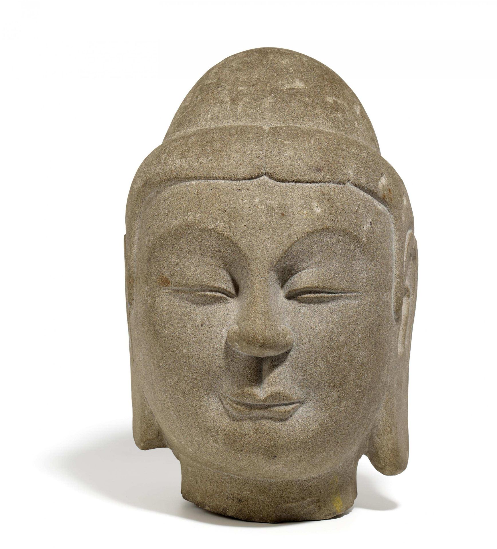 HEAD OF A BUDDHA. China. Northern Qi - early Sui dynasty. 6th c. Lime sandstone, finely modeled