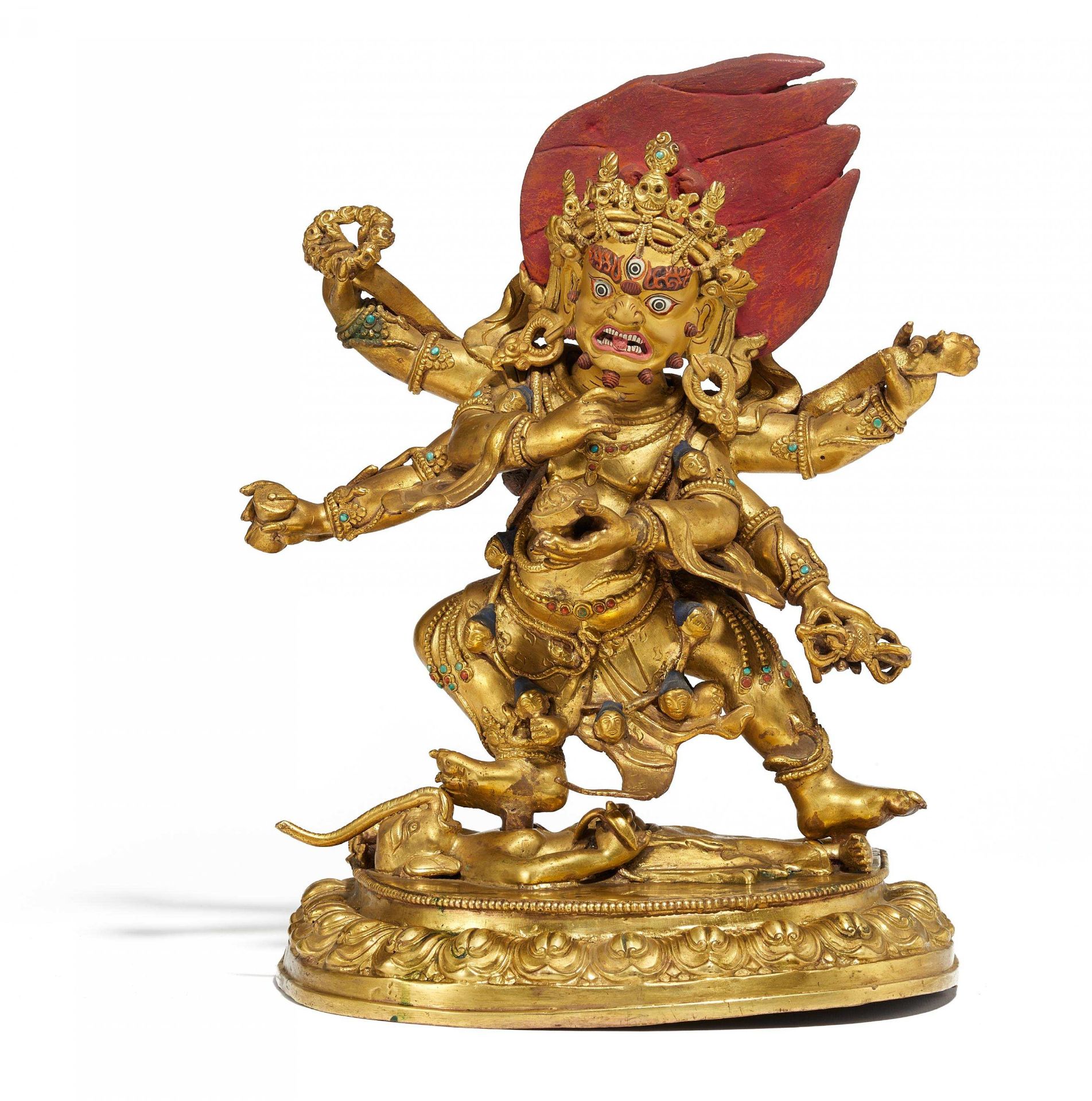 TALL SHADBHUJA MAHAKALA. Tibet. Brass, fire gilt, with gold and pigment painting and inlayed with