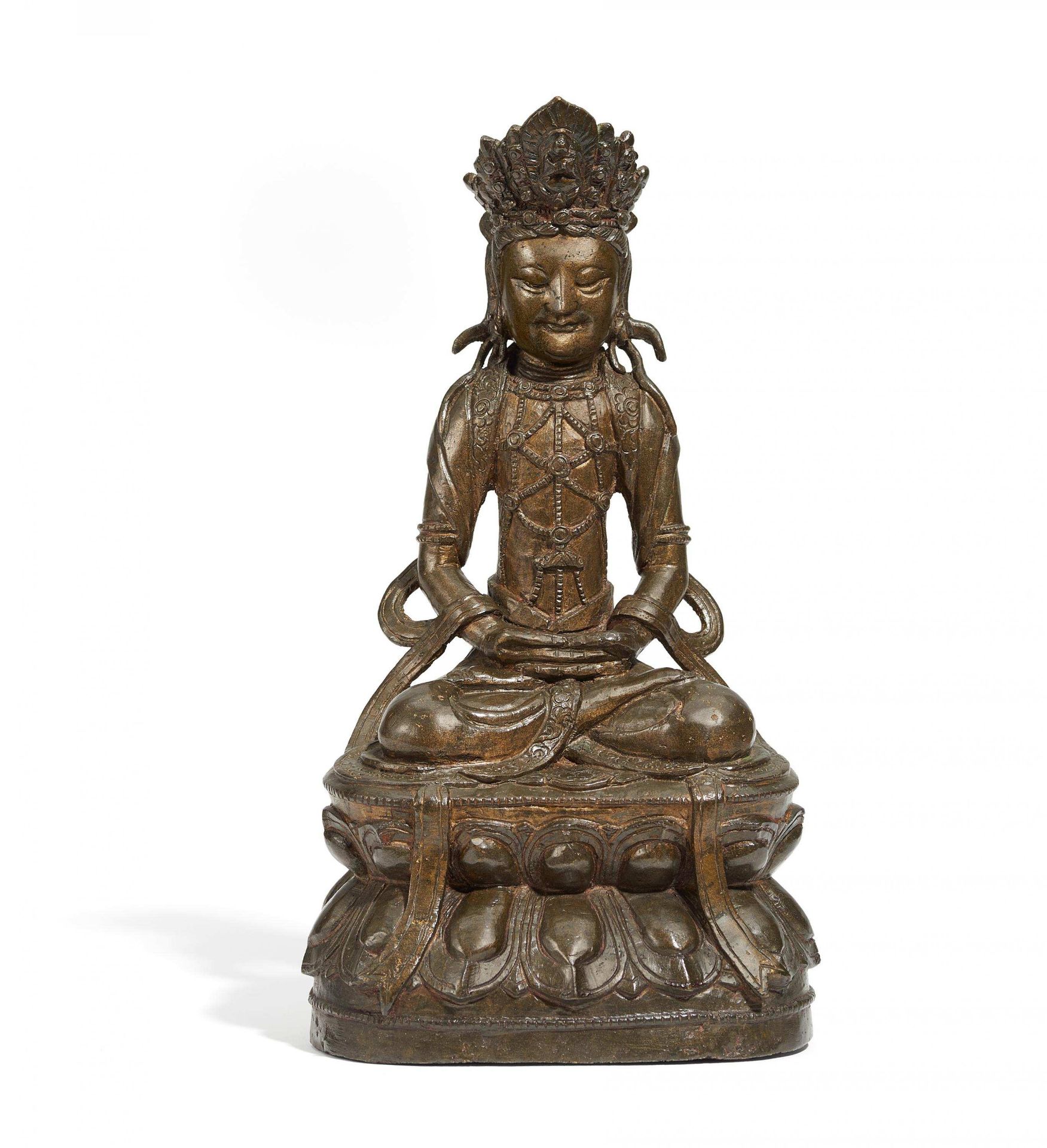 GUANYIN ON A HIGH LOTUSTHRONE. China. Yuan to early Ming dynasty. 14th/15th c. Bronze with shiny and