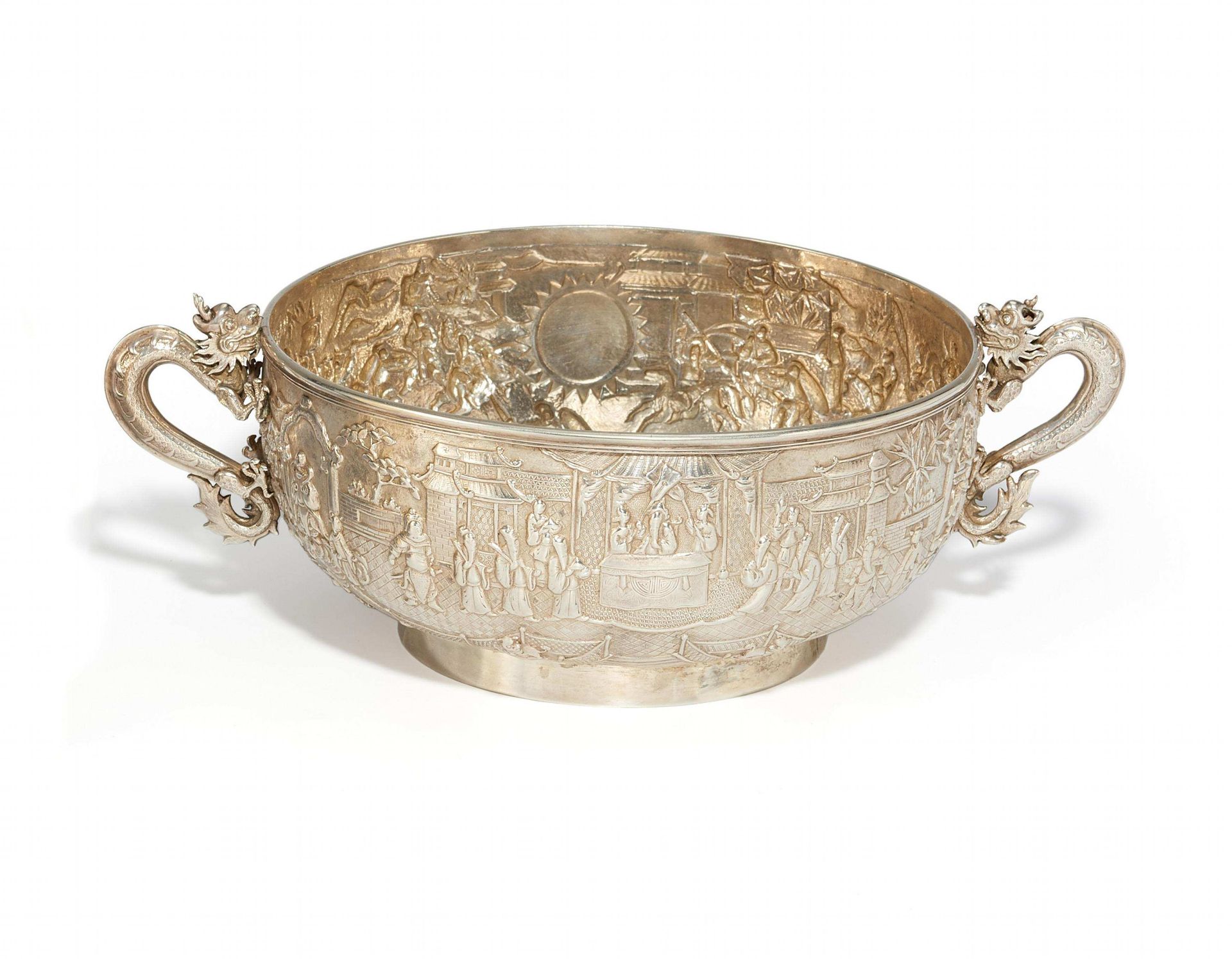 BOWL WITH THE HEAVENLY EMPEROR. China. About 1900. Silver Repoussé. On the outside of the wide