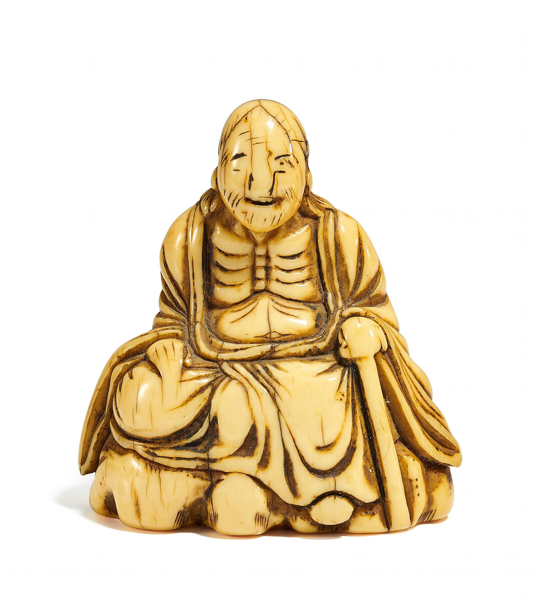 NETSUKE: CHINESISCHER BUDDHIST. Japan. Edo-Zeit. 18. Jh. Elfenbein. Sitzend auf einem Felsen, mit
