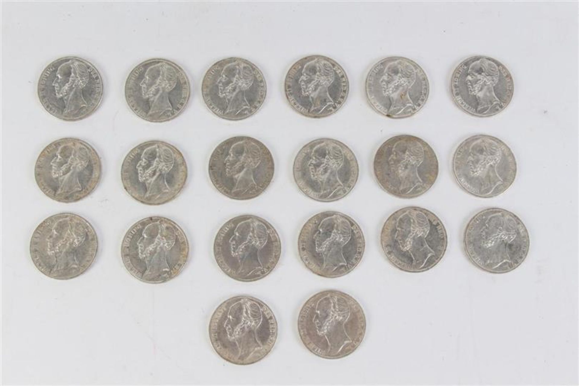 Zilveren guldens Willem II: 10 stuks uit 1845 en 10 stuks uit 1847.
